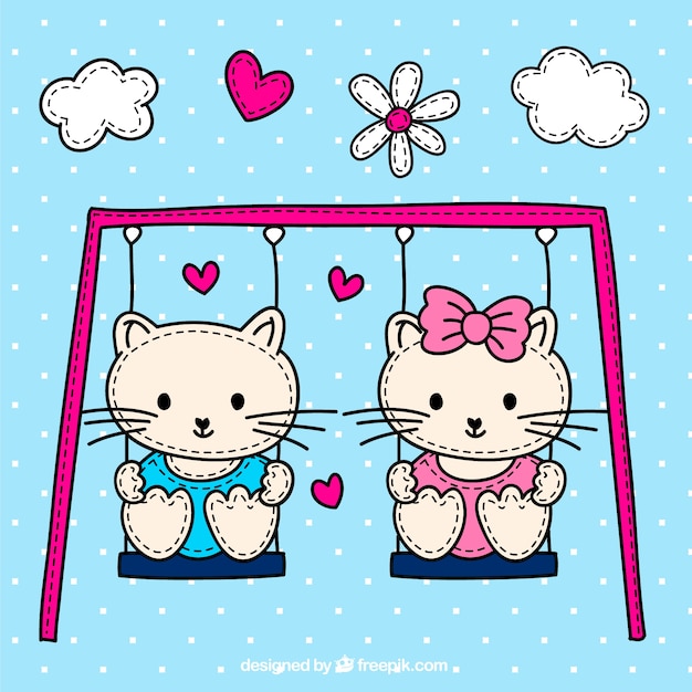 Cute cats on the swing