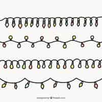 Free vector cute collection of hand drawn christmas lights