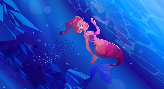 Cute girl mermaid underwater in sea