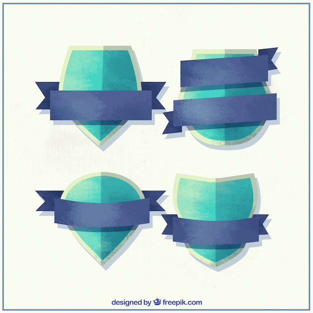 Free vector cute watercolor crests with decorative ribbons