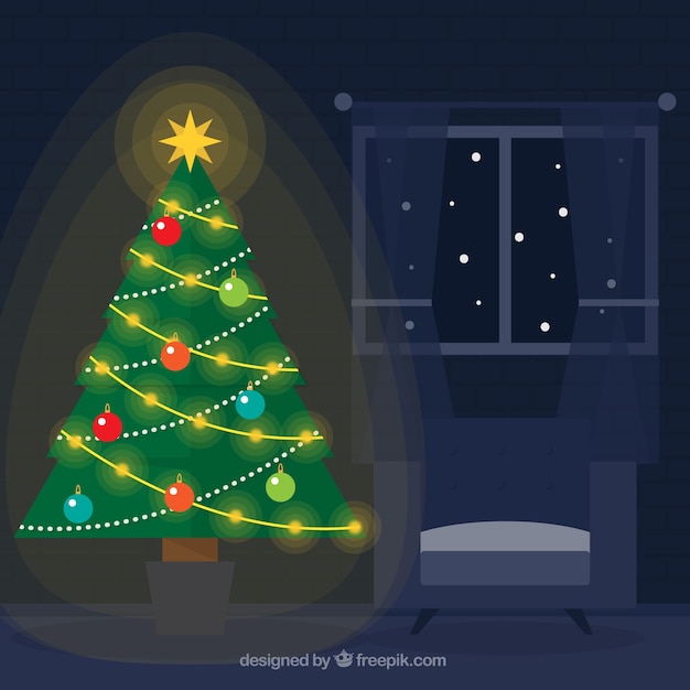 Iluminated 크리스마스 트리와 어두운 집 배경