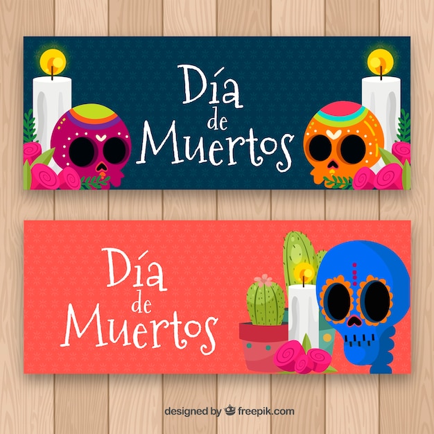 Day of death banners with colorful skulls