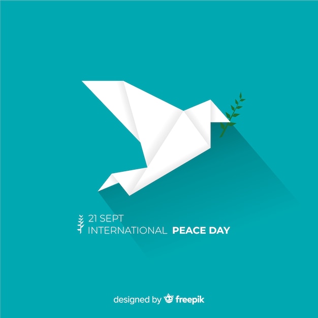 Day of peace composition with origami white dove