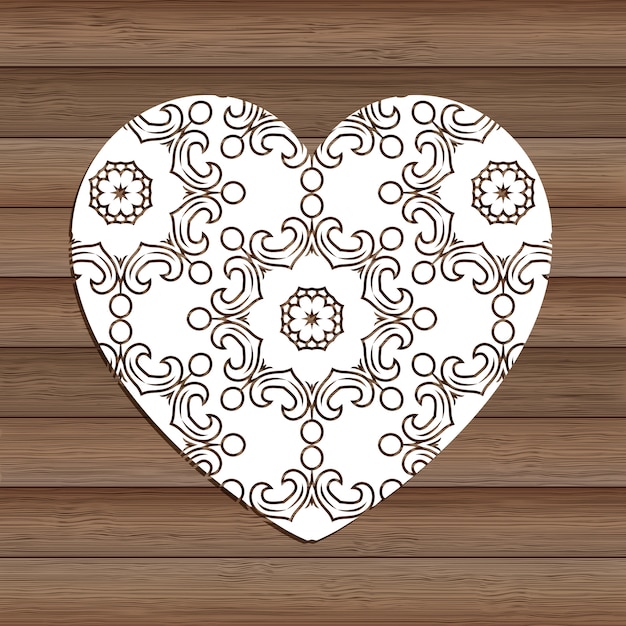 Free vector decorative cutout heart on wooden texture