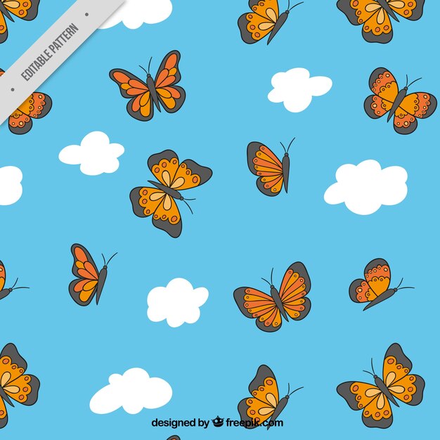 Decorative pattern of clouds and butterflies
