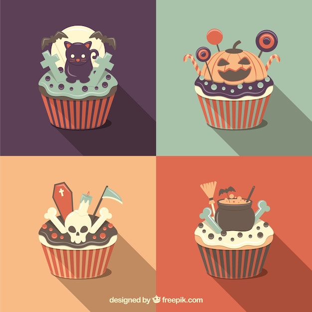 Free vector delicious halloween cupcakes