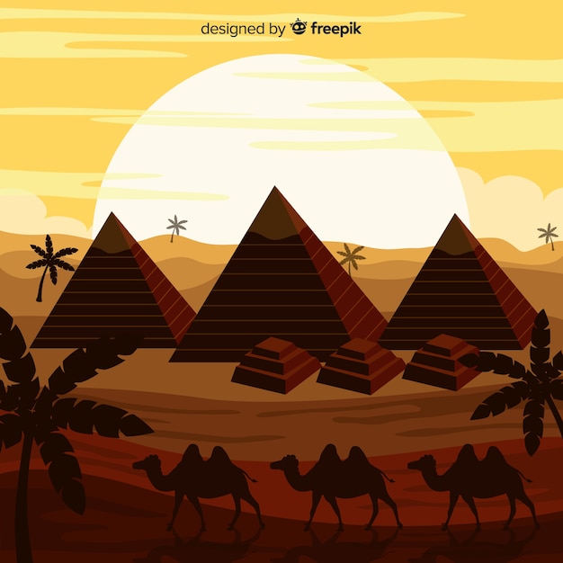 Desert landscape with pyramids and caravan