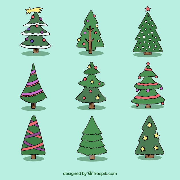 Vettore gratuito diversi disegnati a mano gli alberi di natale