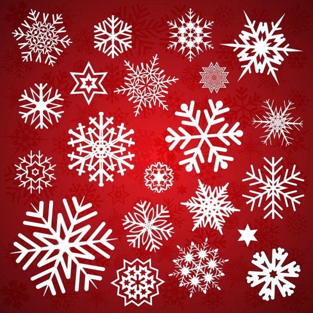 Free vector different snowflakes on a red background