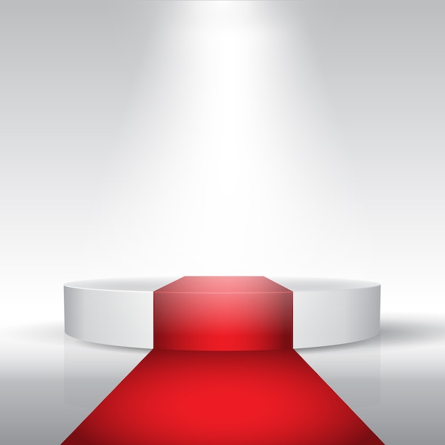 Display podium with red carpet under a spotlight