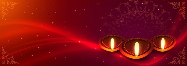 Vettore gratuito striscione diwali con decoro diya ed effetto luce