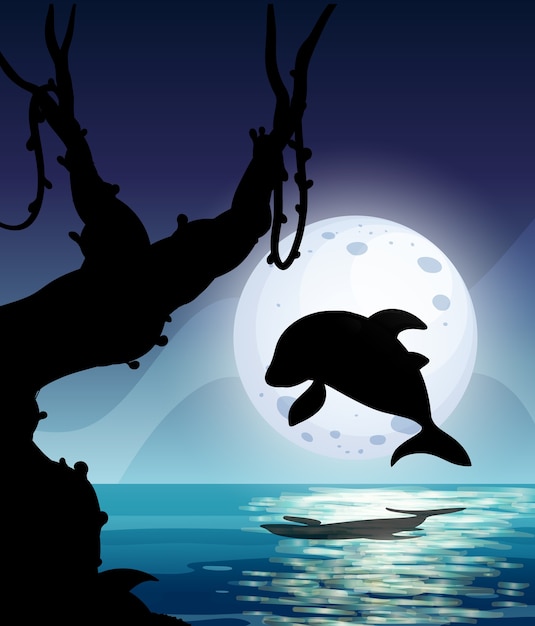 夜に海に飛び込むイルカのシルエテ
