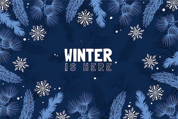 Free vector drawn background with leaves and winter is here message