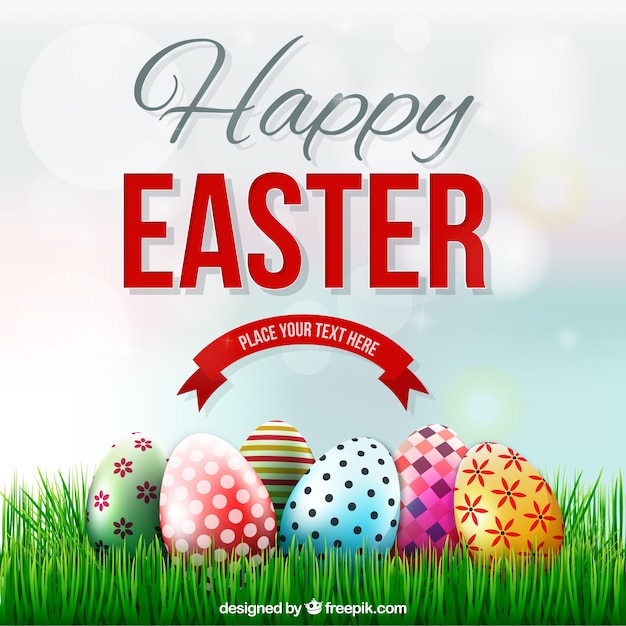 Easter card with decorated eggs on the grass