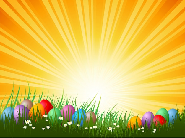 Free vector easter eggs in grass on a sunny day