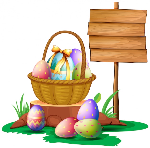 Easter eggs near a wooden signboard