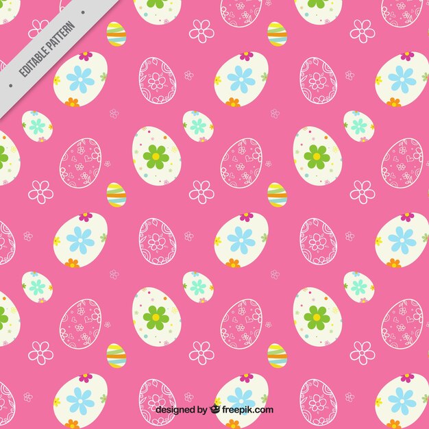 Easter pattern with decorative eggs and pink background