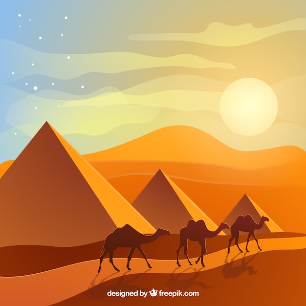 Egypt landscape with caravan and pyramids