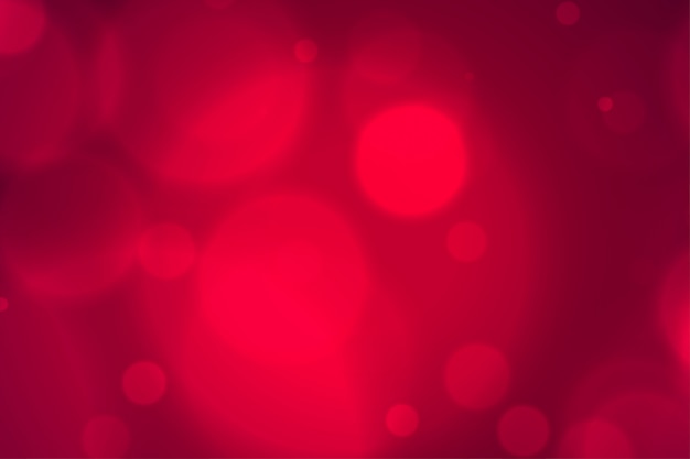 Vettore gratuito il bokeh rosso confuso elegante accende il fondo