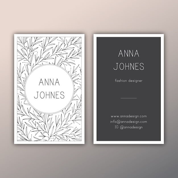 Free vector elegant business card with hand drawn floral illustrations