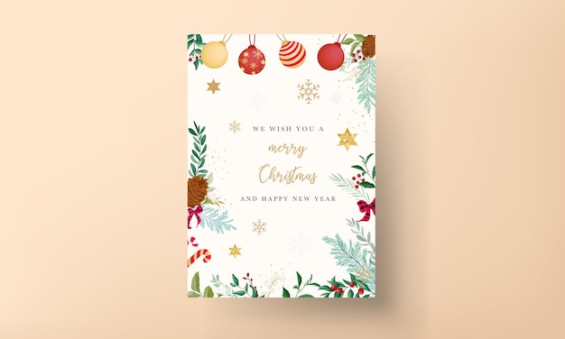 無料ベクター クリスマスの飾りと美しい葉を持つエレガントなクリスマスカードのデザイン