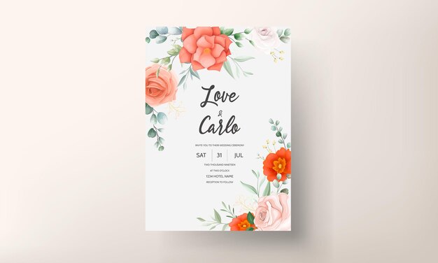 美しいオレンジ色の花で飾られたエレガントな結婚式の招待カード