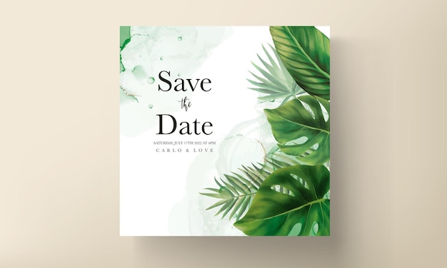 Elegant wedding invitation card with green tropical leaves watercolor