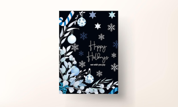 葉とクリスマスの飾りとエレガントな白いクリスマスカードのデザイン
