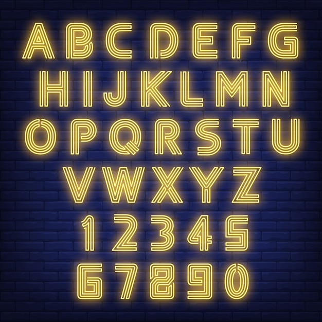 Английский алфавит неоновый знак. Светящиеся буквы и цифры на фоне темной кирпичной стены.