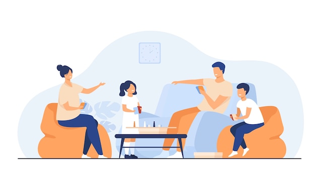 Family home activities concept. Happy boy and girl with parents playing board games with cards and dices in living room. For entertainment, togetherness, having together topics