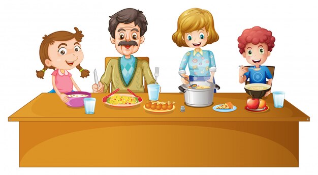 テーブルで夕食を食べている家族