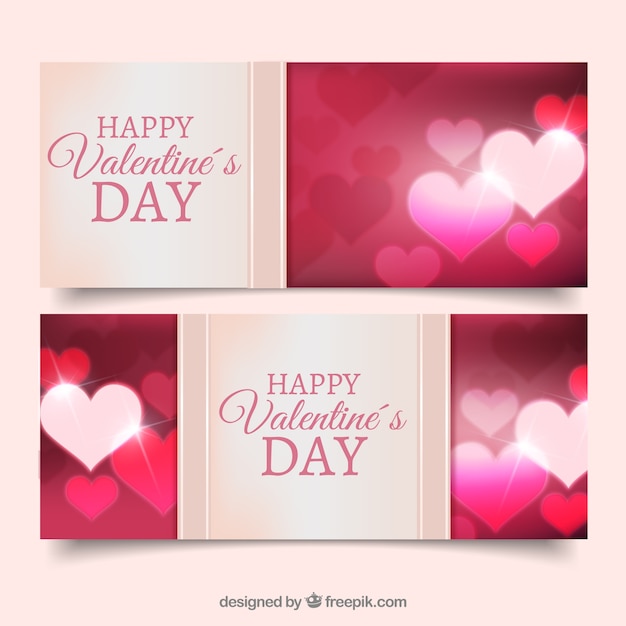 Free vector fantastic valentine's day banners with shiny hearts