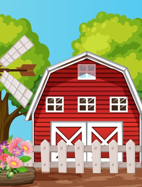 納屋と風車のある自然シーンの農場