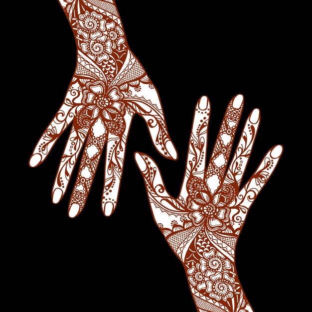 伝統的なインドのmehendiヘナの入れ墨の装飾品で覆われた女性の手