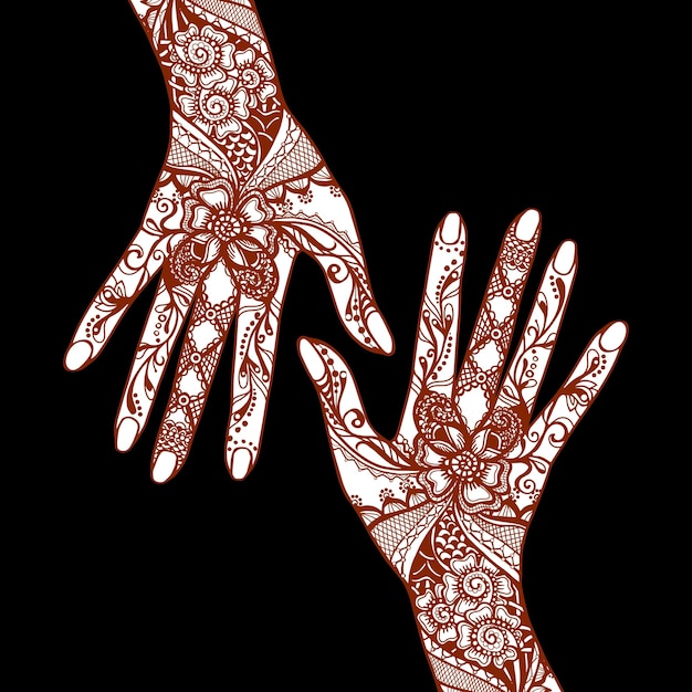 Female hands covered with traditional indian mehendi henna tattoo ornaments