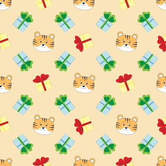弓と虎の明るいギフトボックスとお祝いのベクトルパターン。はがきの美しいクリスマスパターン。包装紙、チラシ、招待状、背景