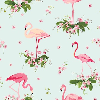 Flamingo bird and tropical orchid flowers background. retro seamless pattern