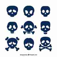 Free vector flat collection of nine blue skulls