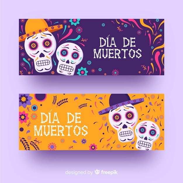 Flat día de muertos skulls with sombrero banners