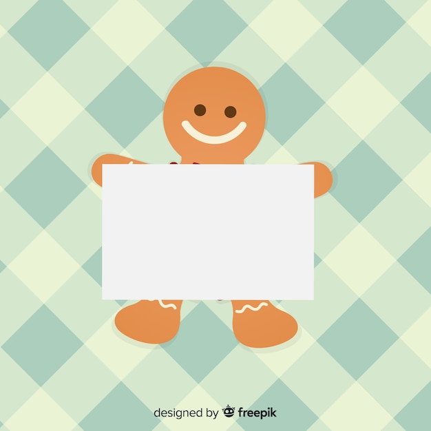 Flat gingerbread man holding blank sign