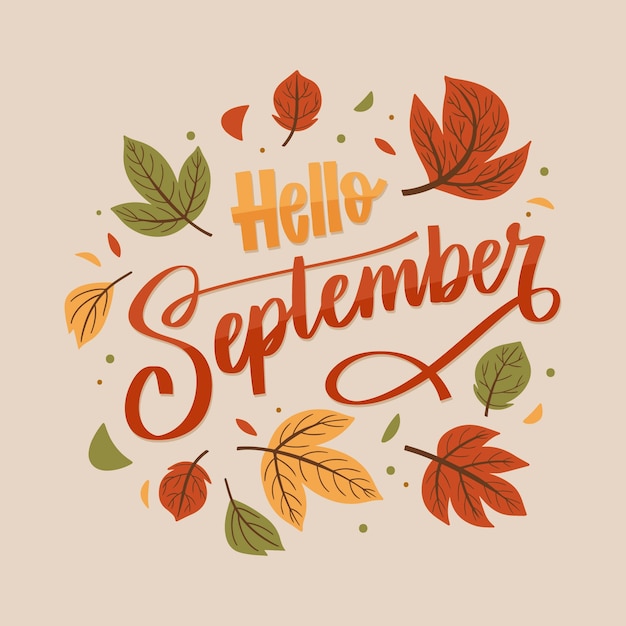 Free vector flat hello september lettering for autumn celebration