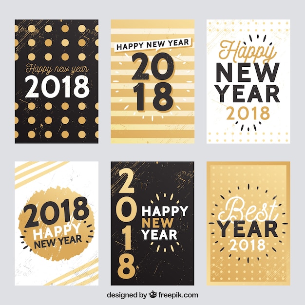 Flat new year 2018 cards in golden