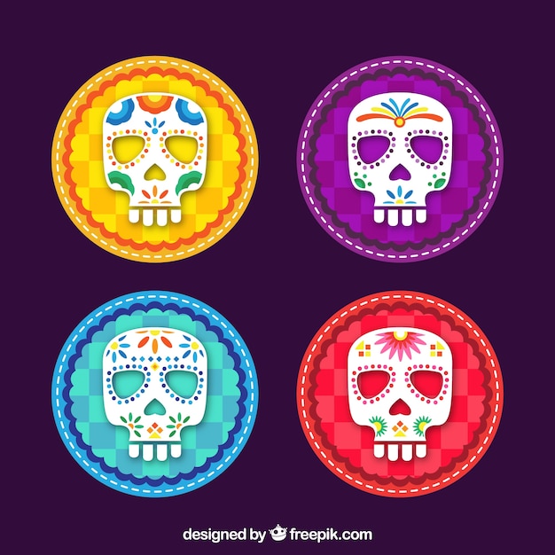 Flat set of four colored mexican skulls