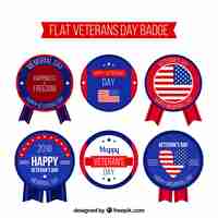 Free vector flat veterans day badges