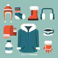 Free vector flat winter clothes and essentials