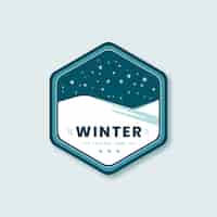 Vettore gratuito modello di logo di celebrazione della stagione invernale piatta