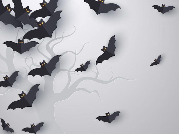 Free vector flying bats background with copy space. 3d paper cut style. grey background with tree silhouette for halloween holiday. vector illustration.