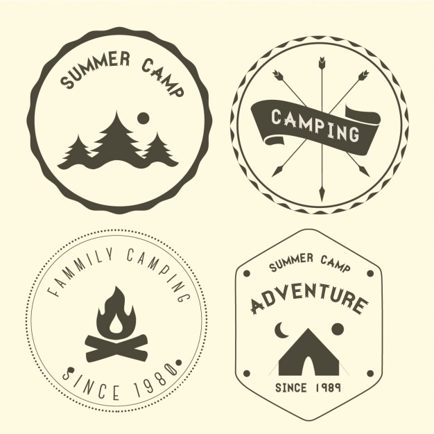 Four camping badges