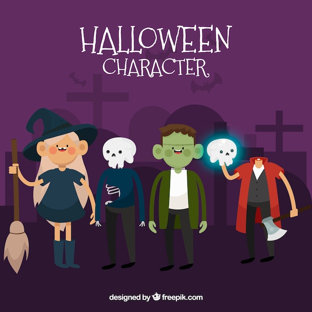 Four halloween characters at the cemetery