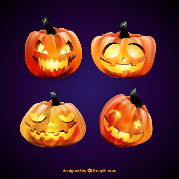 Four lighted halloween pumpkins